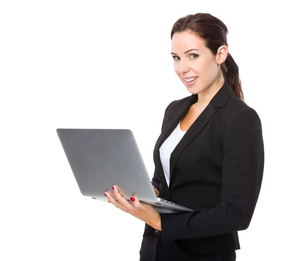 Caucasian businesswoman with laptop Stock Picture