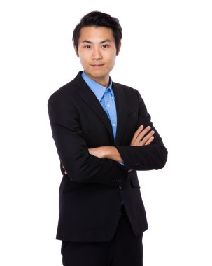 Kolları çapraz iş adamı