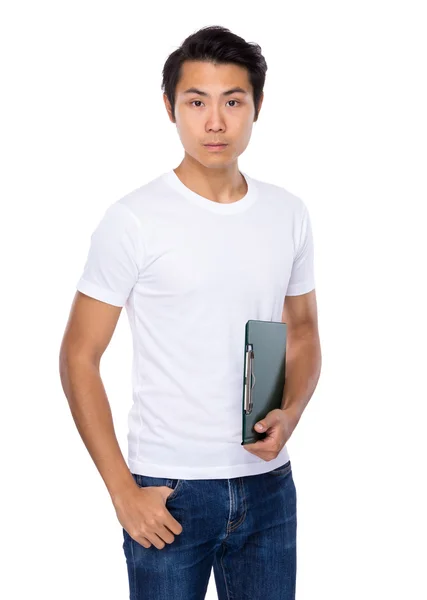 Young man with clipboard — Stock Photo, Image