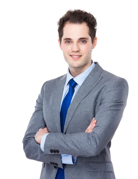 Young businessman with arms crossed Stock Photo