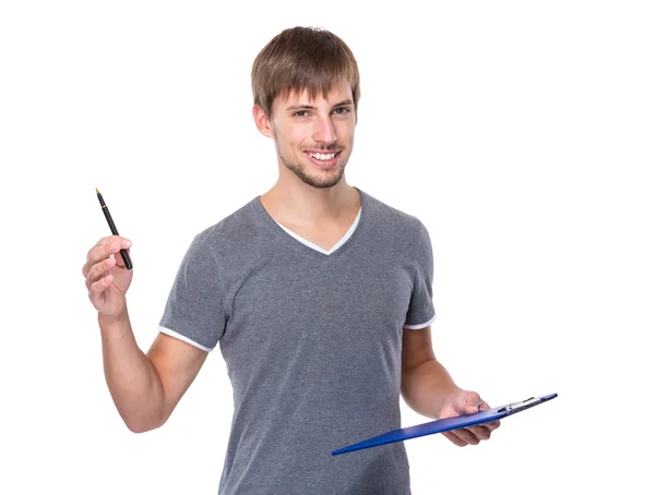 Jeune homme avec presse-papiers — Photo