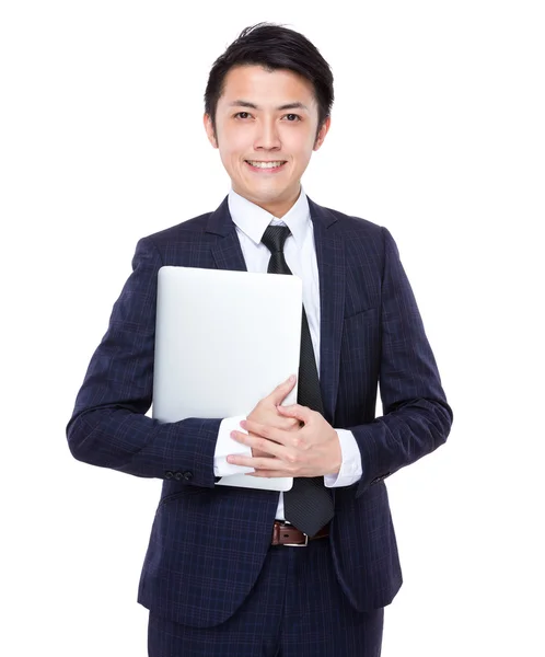 Joven hombre de negocios con portátil — Foto de Stock