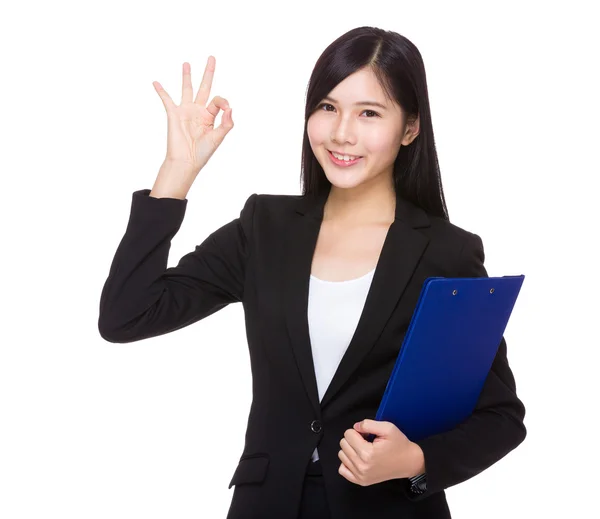 Young businesswoman with clipboard — Stock Photo, Image