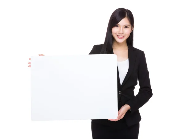 Businesswoman with blank sign — Stock Photo, Image