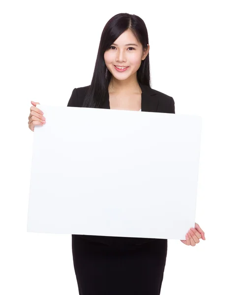 Businesswoman with blank sign — Stock Photo, Image