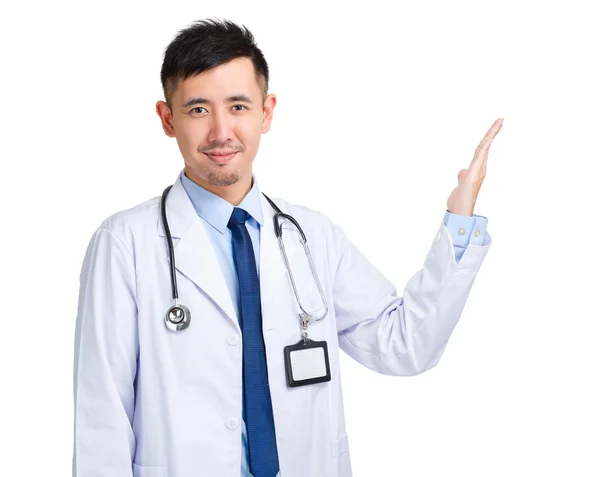 Male doctor giving hand presentation — Stock Photo, Image