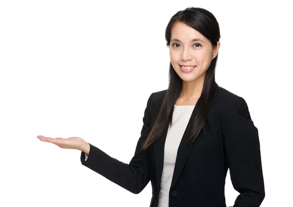 Businesswoman giving hand presentation — Stock Photo, Image