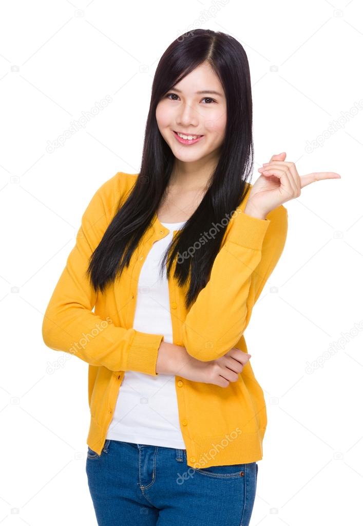 Young asian woman pointing