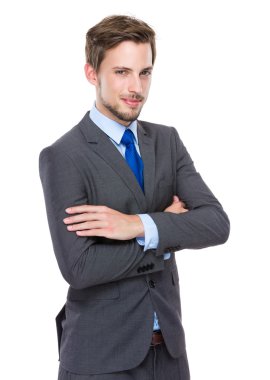 kollarını çapraz yakışıklı işadamı