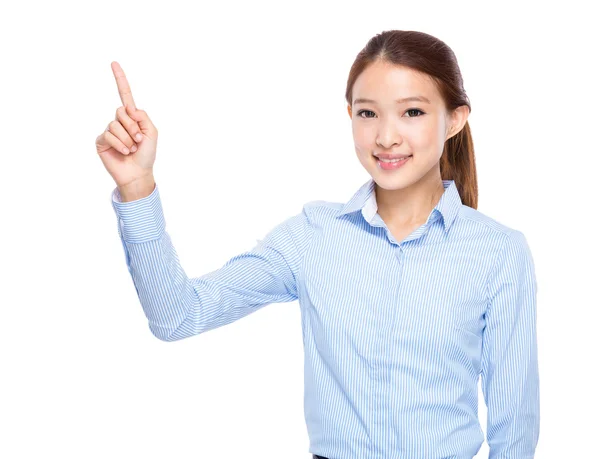 Geschäftsfrau mit erhobenem Zeigefinger — Stockfoto
