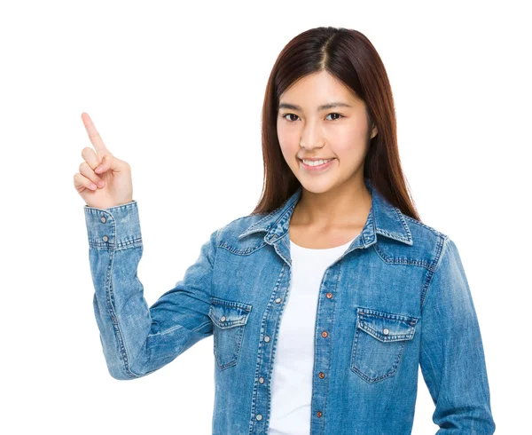 Frau mit erhobenem Zeigefinger — Stockfoto