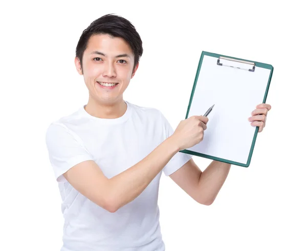 Man with pen point to clipboard — Stock Photo, Image