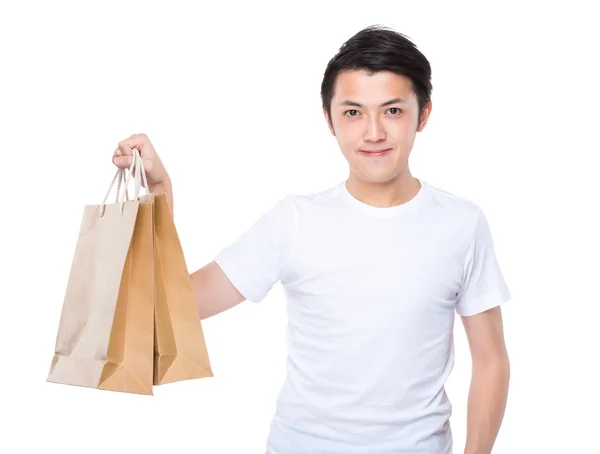 Homme avec des sacs à provisions — Photo