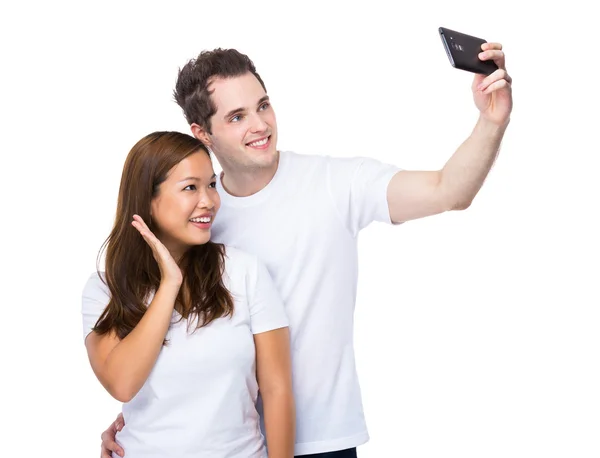 アジアの女性と白人の男は、一緒に selfie を取る — ストック写真