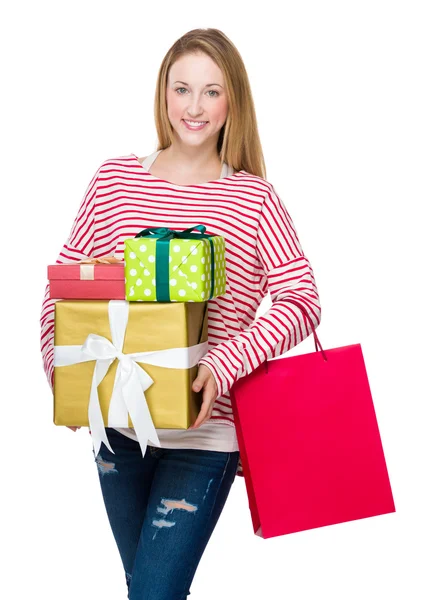 Woman holding shopping bag and gift box — Stock Photo, Image