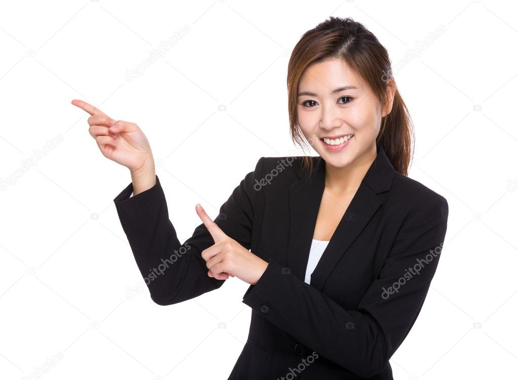Businesswoman with two fingers point up