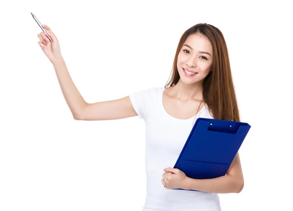 Woman with clipboard and pen up — Stock Photo, Image