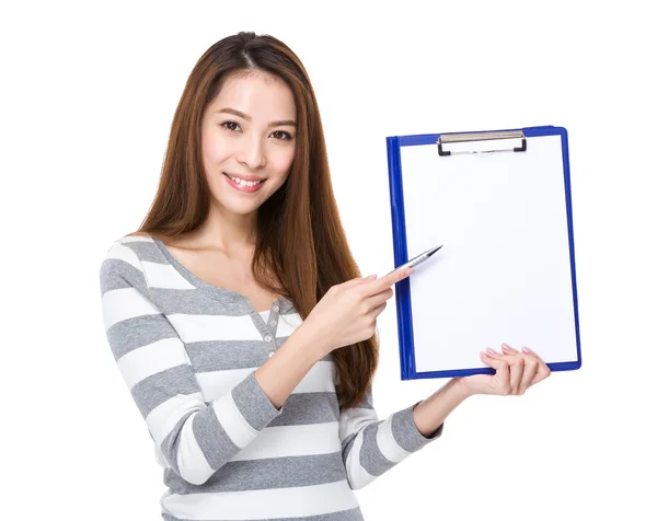 Woman with pen point to clipboard — Stock Photo, Image