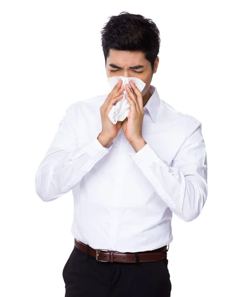 Joven empresario estornudando — Foto de Stock