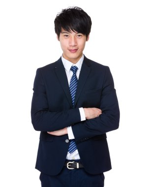 Kolları çapraz iş adamı