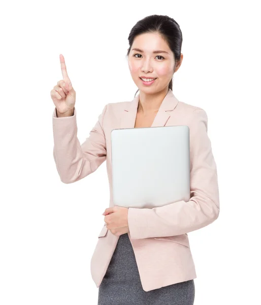 Businesswoman with laptop and finger point up — Stock Photo, Image