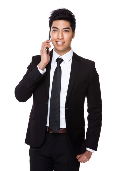 Businessman talking on mobile phone — Stock Photo, Image