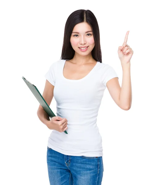 Woman with clipboard and finger point up — Stock Photo, Image