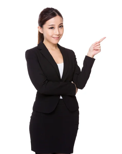 Бізнес-леді з вказівкою пальця вгору — стокове фото