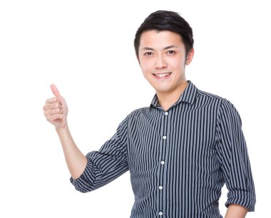 Baş parmağı havada bir iş adamı.