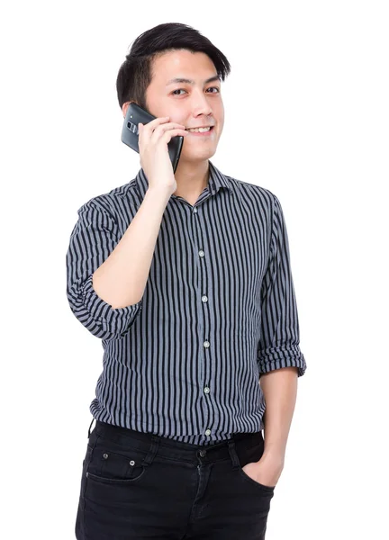 Young businessman talking on cellphone — Stock Photo, Image