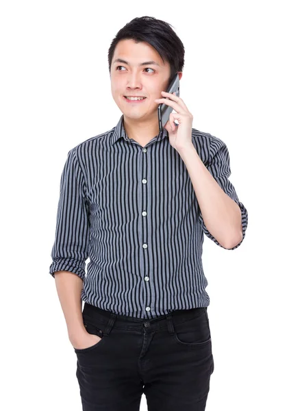 Businessman talking on cellphone — Stock Photo, Image