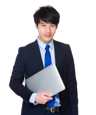 Dizüstü bilgisayarı olan iş adamı