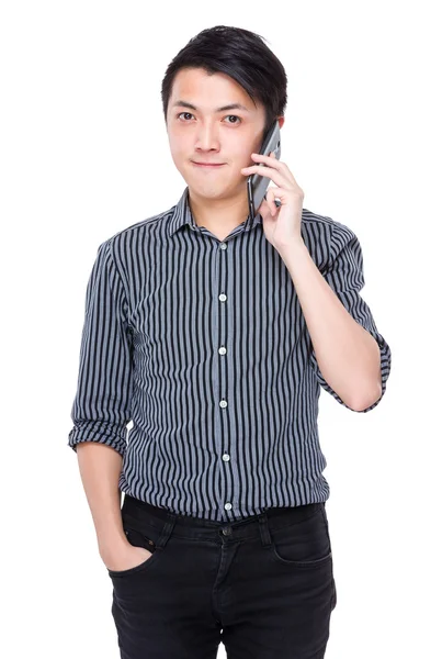 Businessman talking on mobile phone — Stock Photo, Image