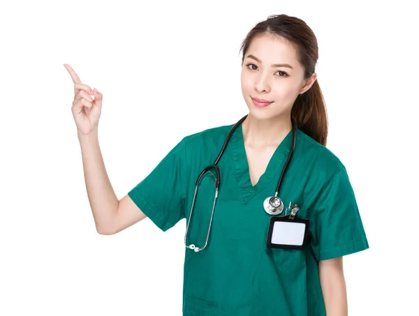 Läkare med finger pekar upp — Stockfoto