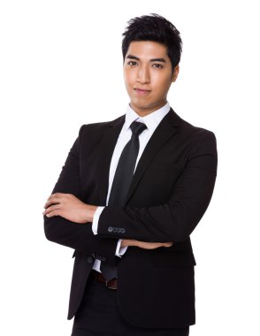 Kolları çapraz iş adamı