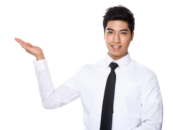 Businessman with hand presentation — Stock Photo, Image