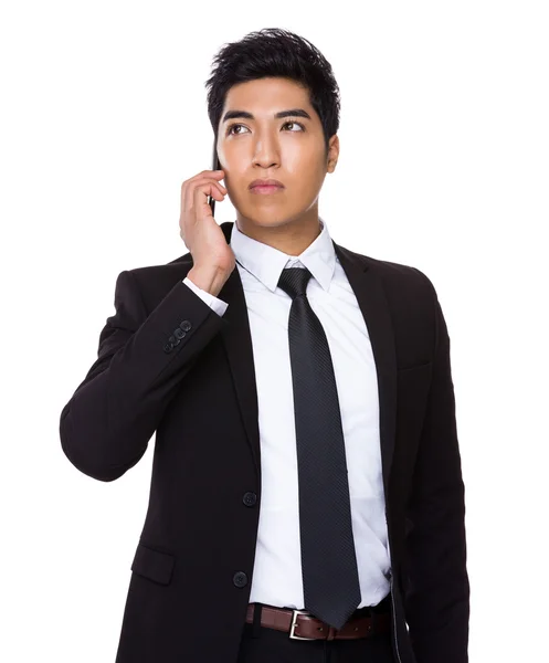 Businessman talking on cellphone — Stock Photo, Image