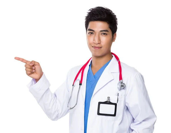 Doctor with finger point aside — Stock Photo, Image