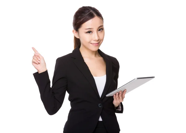 Businesswoman with tablet and finger point up — Stock Photo, Image