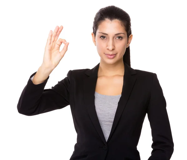 Businesswoman with ok sign Stock Picture