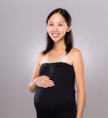 Beautiful pregnant woman portrait clipart