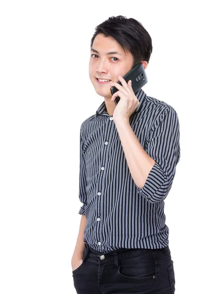 Businessman talking on mobile phone — Stock Photo, Image