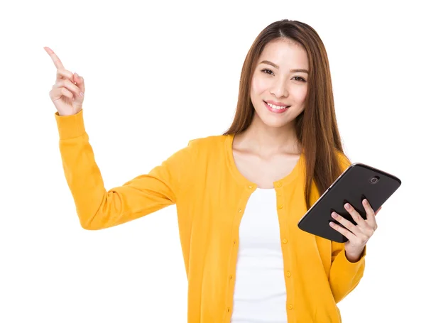 Woman with tablet and finger point up — Stock Photo, Image