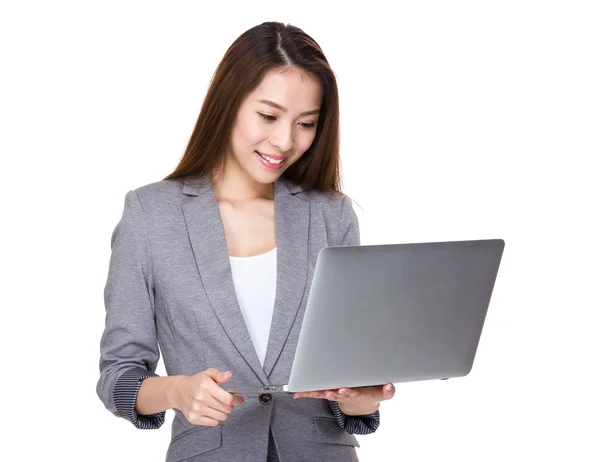 Businesswoman using laptop — Stock Photo, Image