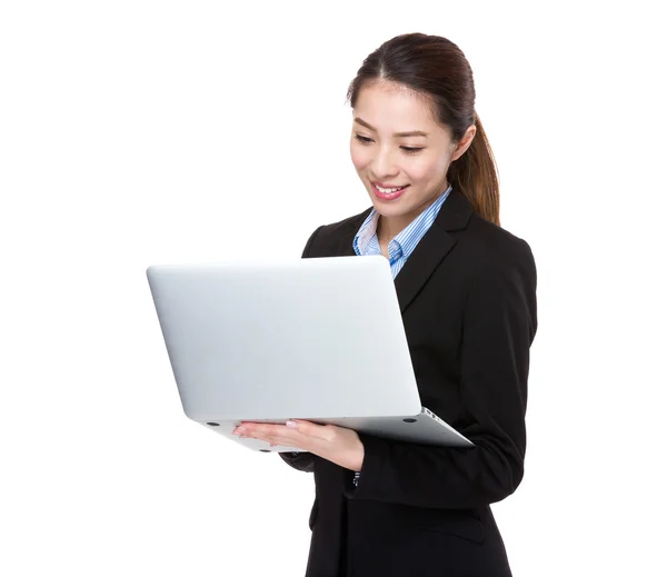 Businesswoman using laptop computer — Stock Photo, Image