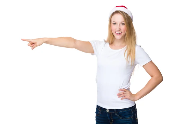 Christmas woman with finger point aside — Stock Photo, Image