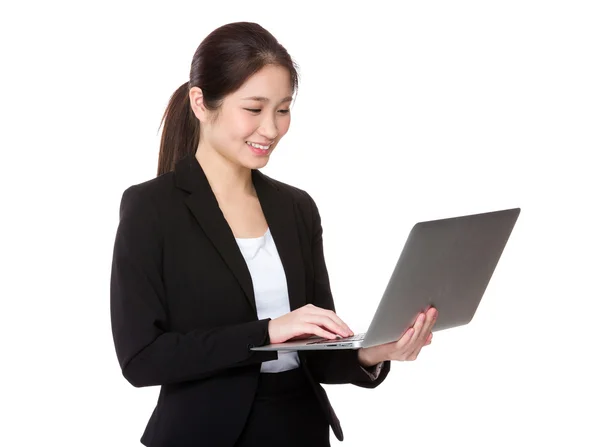 Businesswoman using laptop — Stock Photo, Image