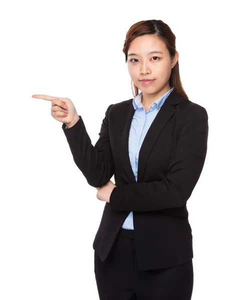 Businesswoman with finger point aside — Stock Photo, Image