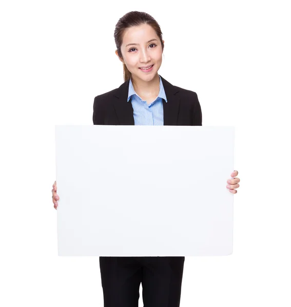 Businesswoman with white card board — Stock Photo, Image