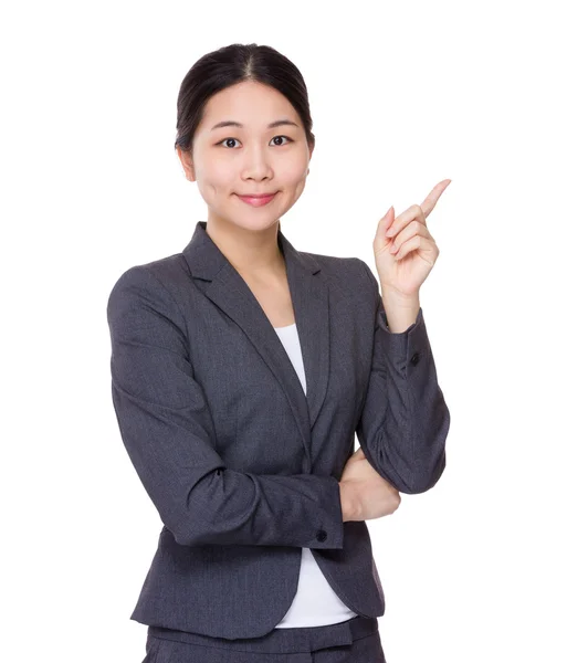 Zakenvrouw met vinger punt omhoog — Stockfoto